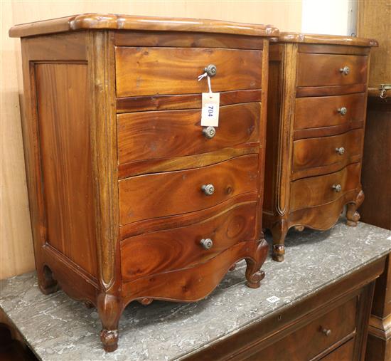 A pair of mahogany four drawer bedside cupboards W.53cm.